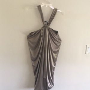 Slinky gold party dress, dramatic neckline